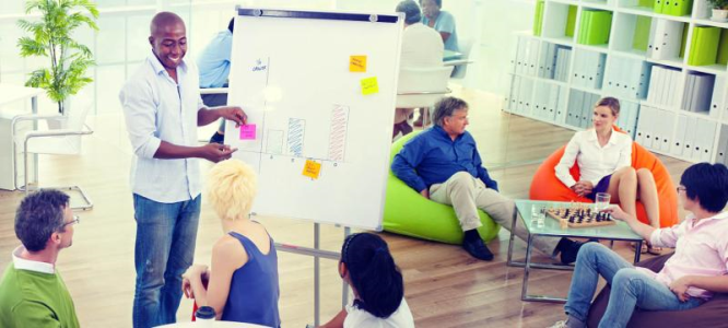 Group of employees working on a culture transformation model for their business